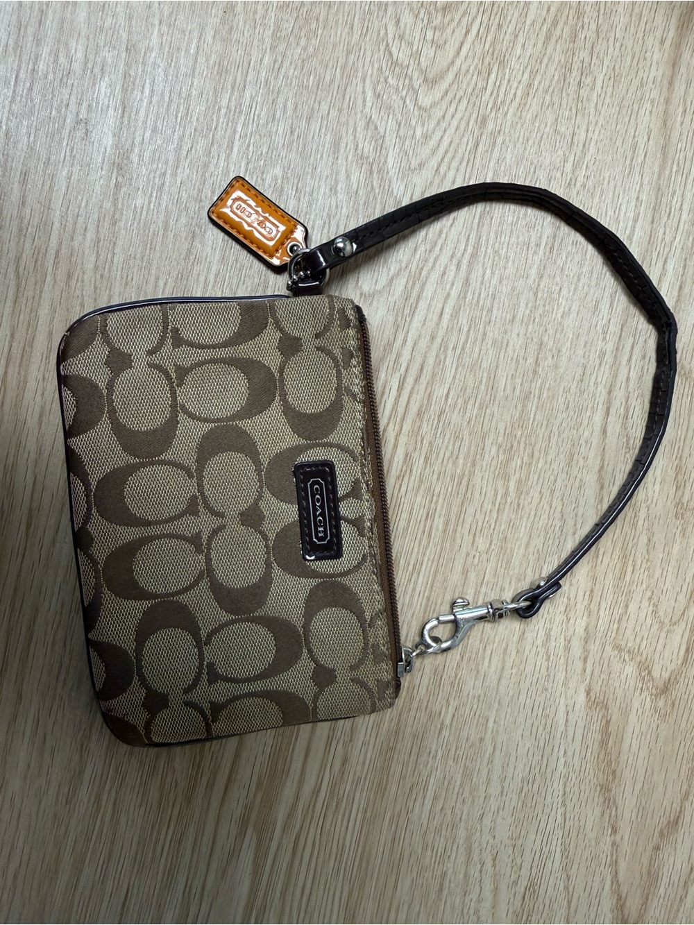 Coach Signature C Jacquard Wristlet Brown Patent Leather Orange Tag